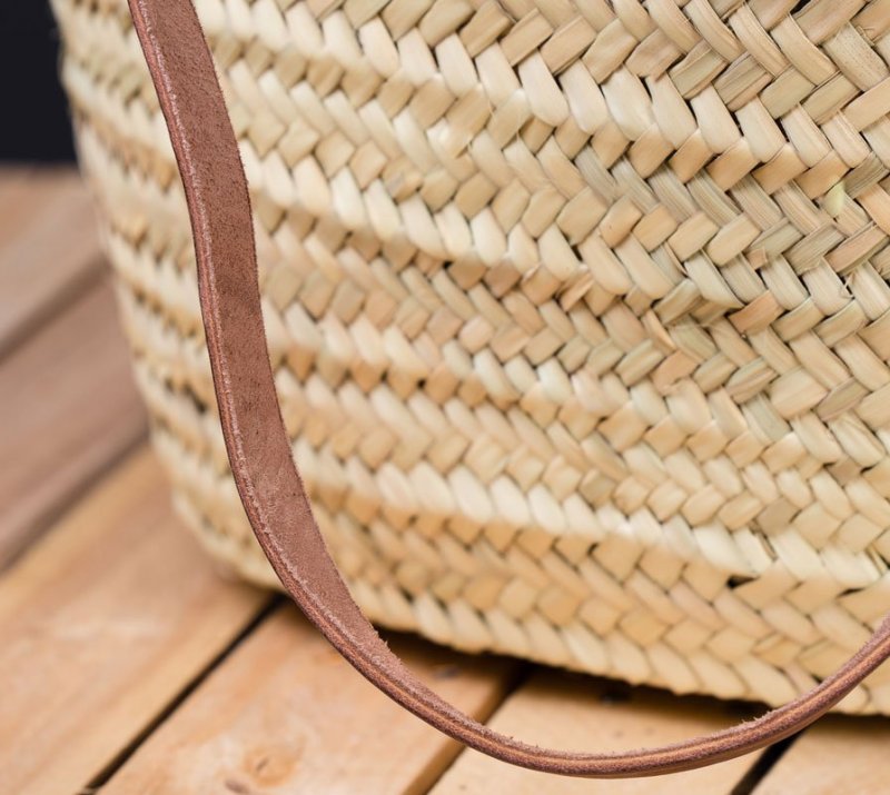 Natural basket with a long strap